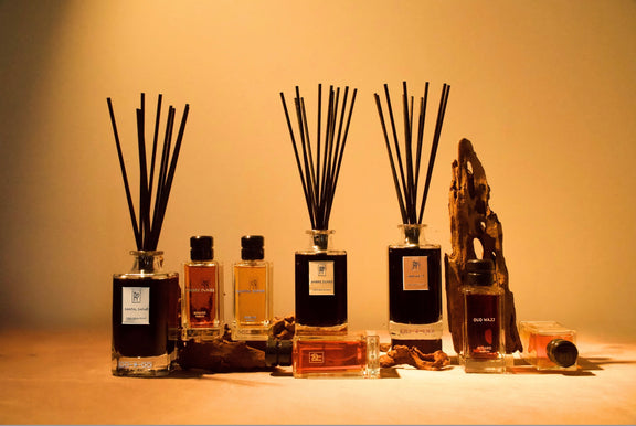 Rosard Parfum extrait reed diffusers and room sprays in Oud Wajj, Ambre Dunes and Santal Safar, styled with agarwood